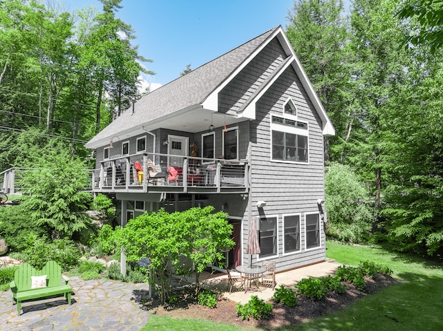 rear view of house with a patio