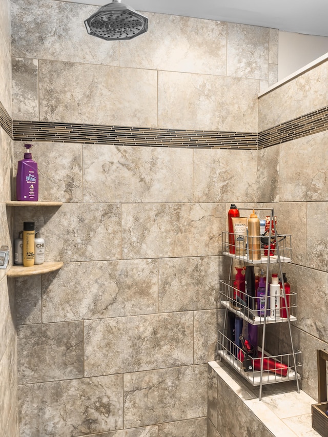 details with a tile shower