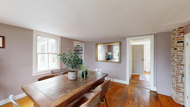 dining room featuring hardwood / wood-style flooring