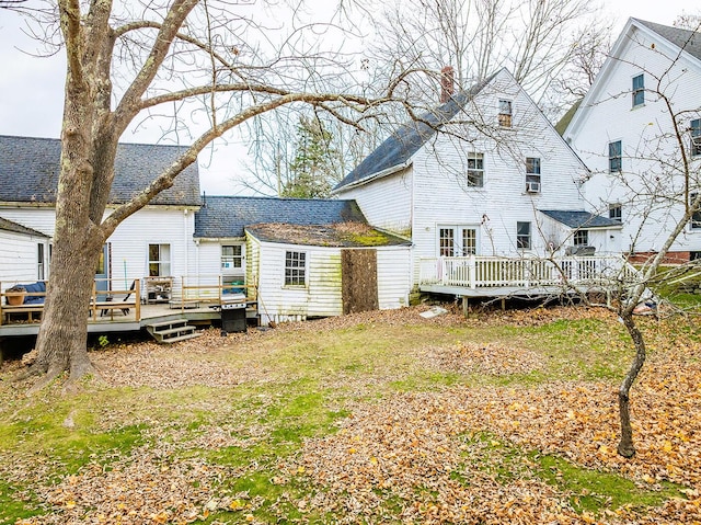 rear view of house with a deck