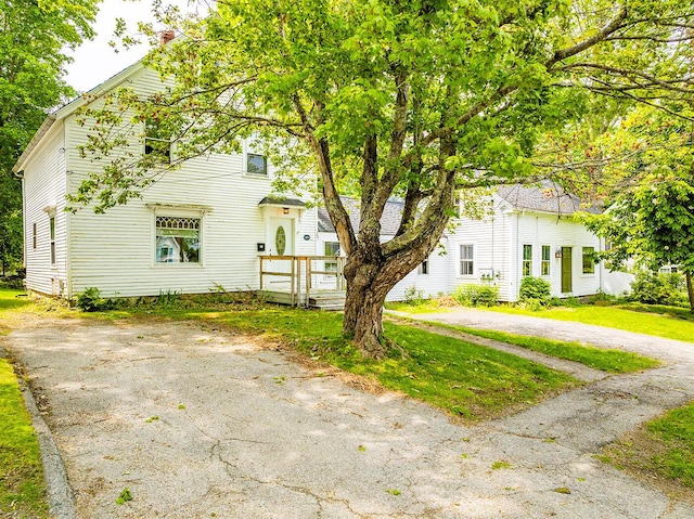 97 Chestnut St, Camden, ME 04843 - view of front of house featuring a front lawn