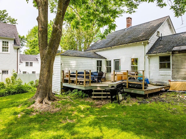 97 Chestnut St, Camden, ME 04843 - rear view of property featuring a chimney, a lawn, and a wooden deck