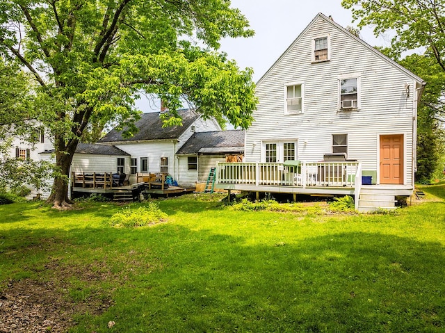97 Chestnut St, Camden, ME 04843 - back of property with a deck and a yard