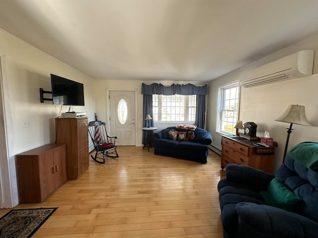 living room featuring an AC wall unit, a baseboard heating unit, and light hardwood / wood-style flooring