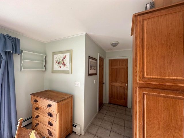 hallway with light tile patterned floors, crown molding, and a baseboard heating unit