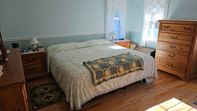 bedroom featuring hardwood / wood-style floors