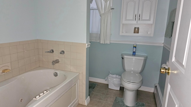 bathroom with a bathtub, toilet, tile patterned flooring, and a baseboard heating unit