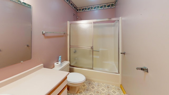 full bathroom with toilet, vanity, and enclosed tub / shower combo