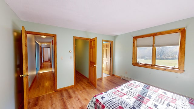 bedroom featuring light wood-type flooring