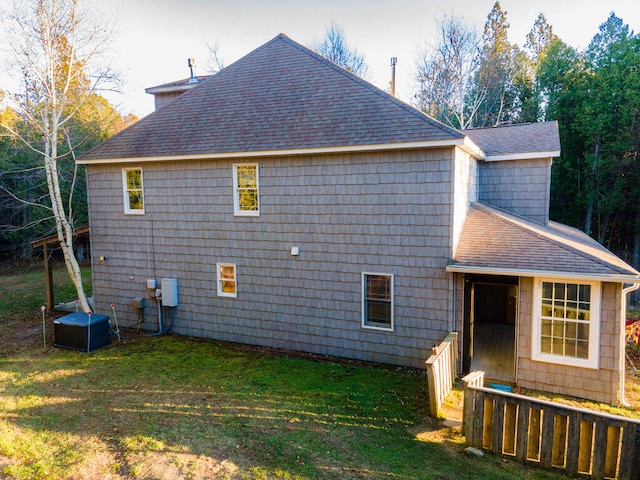 view of home's exterior featuring a yard