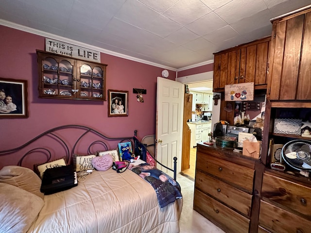 carpeted bedroom with crown molding