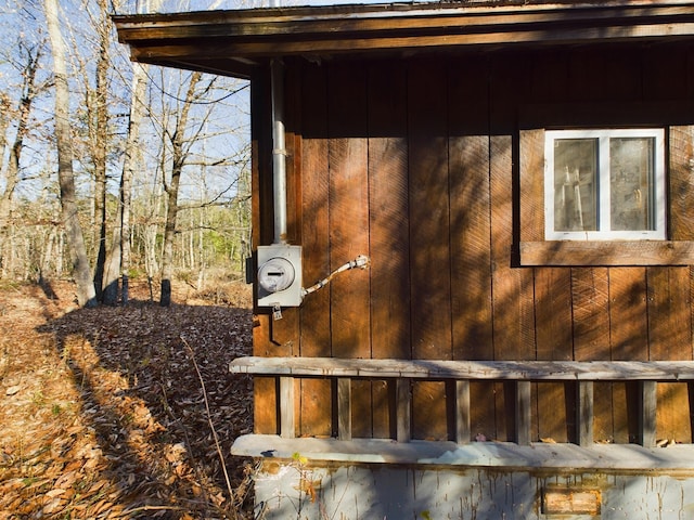 details featuring wood walls