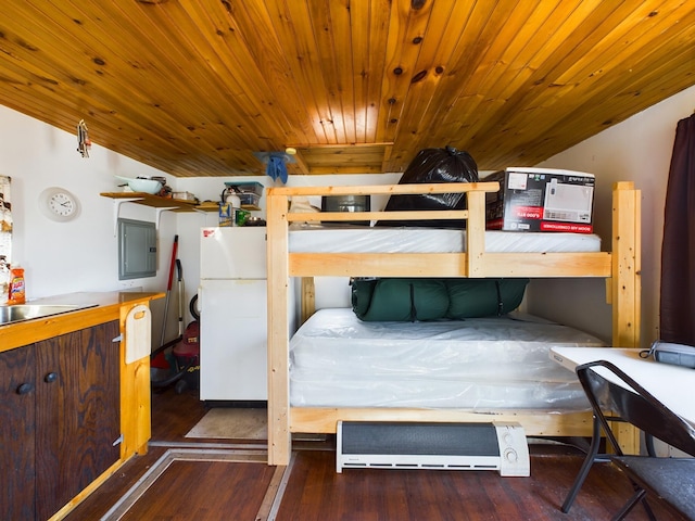 bedroom with wooden ceiling, dark hardwood / wood-style floors, white refrigerator, and electric panel