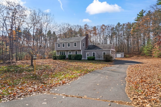 front of property with a garage