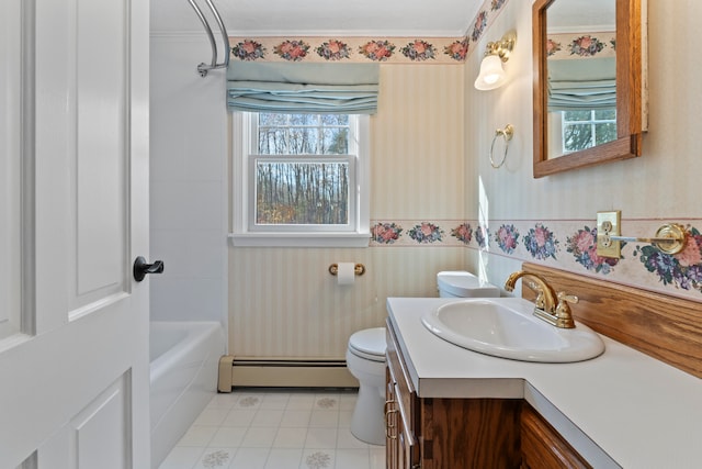 bathroom with baseboard heating, vanity, and toilet