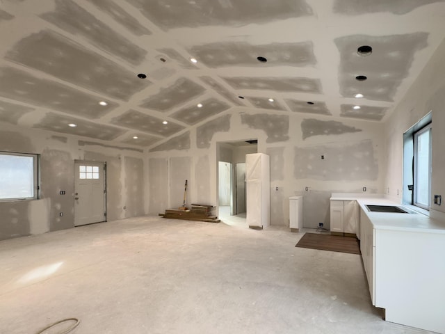 interior space featuring vaulted ceiling