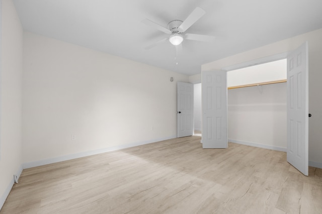 unfurnished bedroom with ceiling fan, a closet, and light hardwood / wood-style flooring