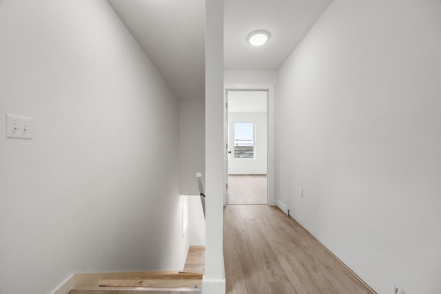 hallway with light wood-type flooring