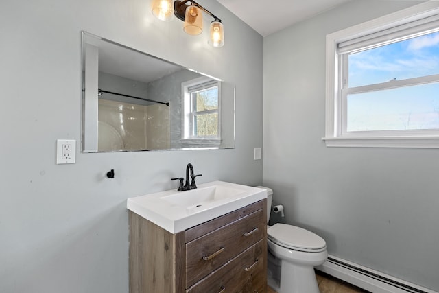 bathroom featuring vanity, toilet, a shower, and a baseboard heating unit