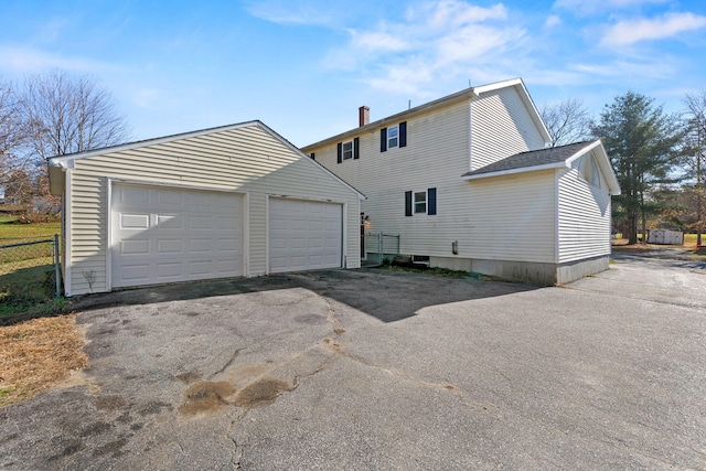 exterior space featuring a garage