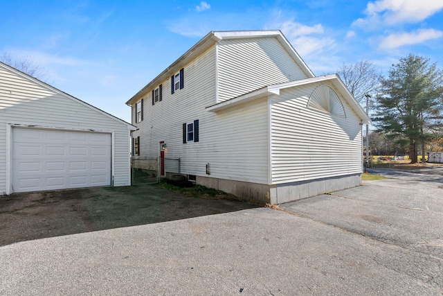 view of property exterior featuring a garage