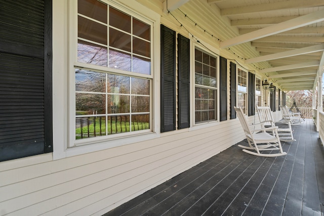 wooden terrace with covered porch