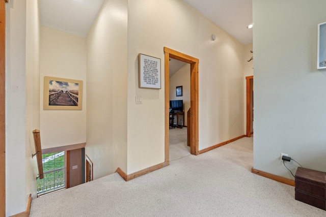 hallway with light carpet