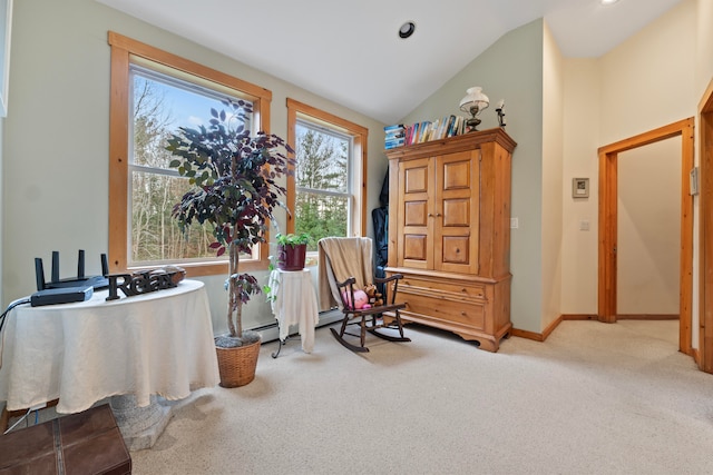 living area with light carpet and lofted ceiling