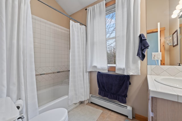 full bathroom with shower / tub combo, vanity, a baseboard heating unit, tile patterned flooring, and toilet