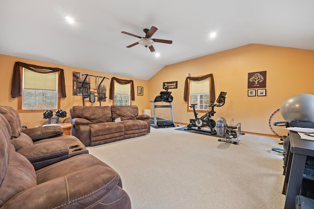 carpeted living room featuring ceiling fan and lofted ceiling