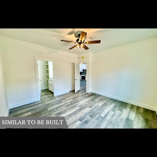 unfurnished bedroom featuring ceiling fan, a closet, ensuite bathroom, and light wood-type flooring