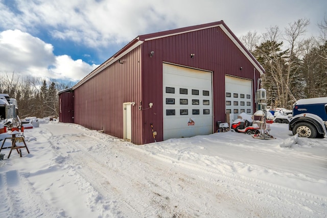 view of snow covered garage