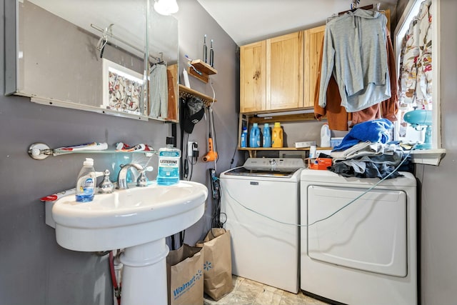 laundry room featuring separate washer and dryer