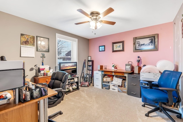 carpeted office with ceiling fan