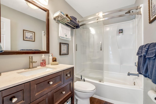 full bathroom featuring toilet, vanity, hardwood / wood-style floors, and shower / washtub combination