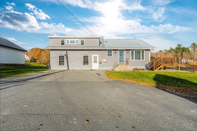 view of front property with a front lawn