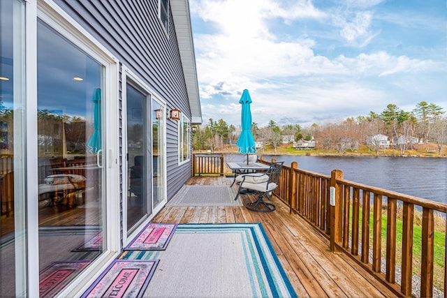 deck featuring a water view