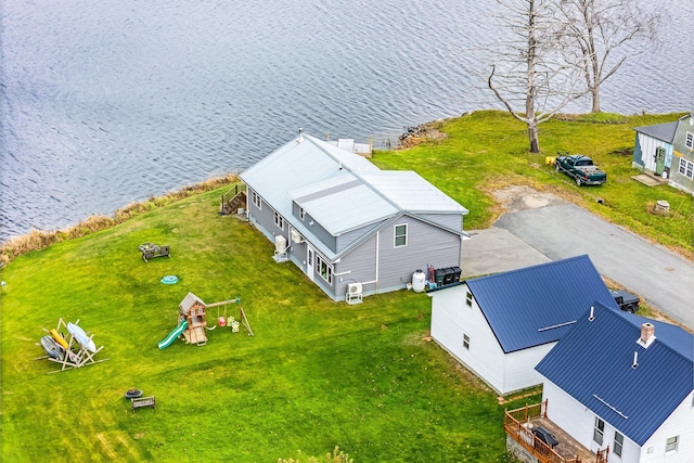 birds eye view of property featuring a water view