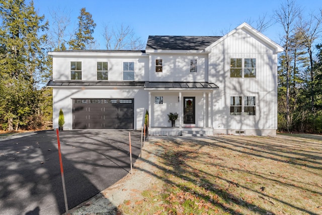 modern farmhouse with a garage