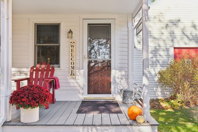 doorway to property with a porch