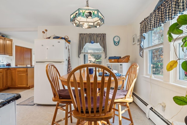 dining room featuring a baseboard radiator