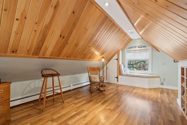 sitting room featuring baseboard heating, wood ceiling, wood-type flooring, and vaulted ceiling