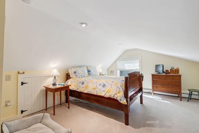 carpeted bedroom with vaulted ceiling