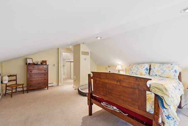 bedroom with a baseboard heating unit, light colored carpet, and lofted ceiling