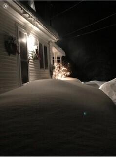 view of yard layered in snow