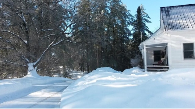 view of yard covered in snow