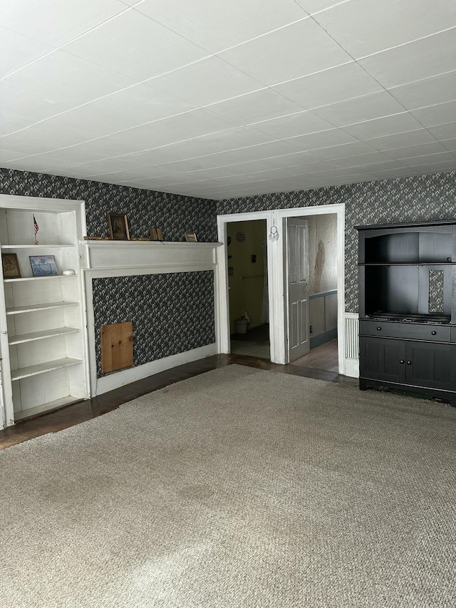 interior space with wallpapered walls