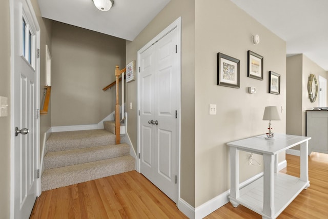 stairway featuring hardwood / wood-style floors