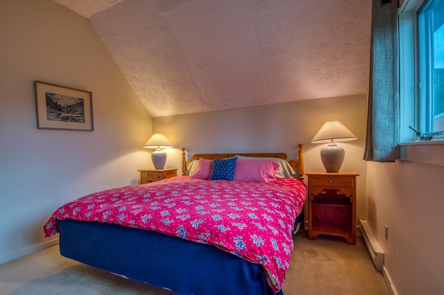 bedroom featuring a baseboard heating unit, carpet, lofted ceiling, and a textured ceiling