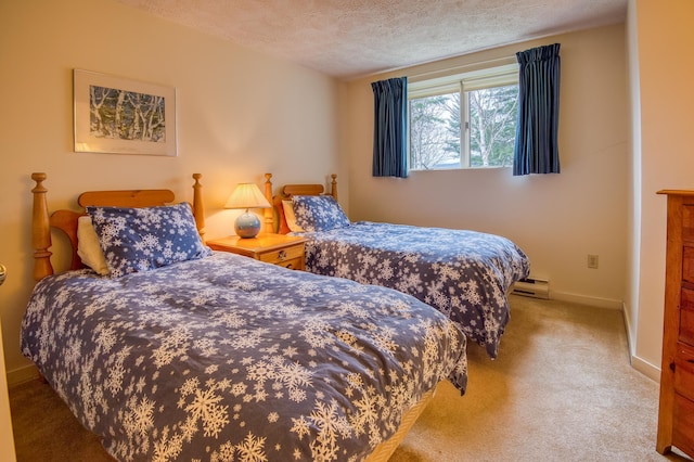 bedroom featuring carpet, a textured ceiling, and a baseboard radiator